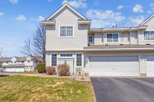 Fantastic end-unit w corner lot w large grassy yard on front and side of TH
