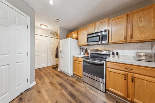 Kitchen w walk-in pantry and plenty of counter space and cabinets