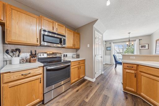 Kitchen w walk-in pantry and plenty of counter space and cabinets