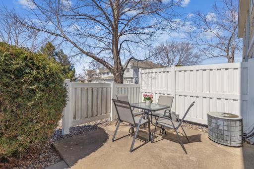Enjoy your private patio w partial fence and landscaping