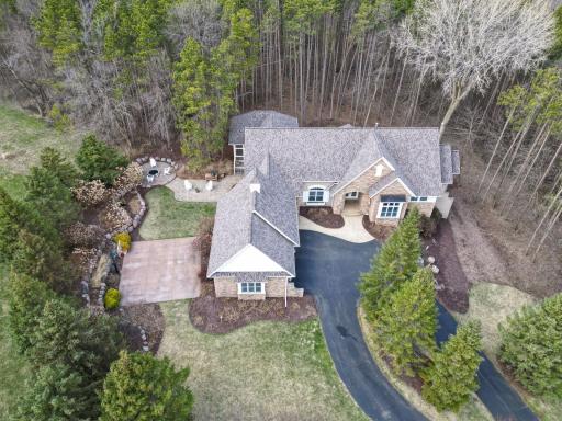 Featuring an outdoor basketball court, and private firepit