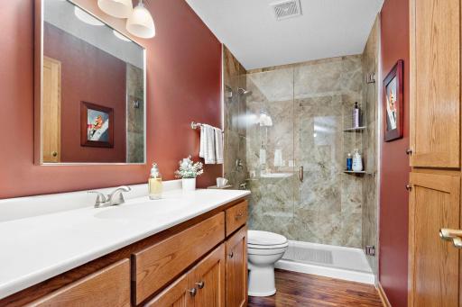 Nicely updated 3/4 bath with walk-in Shower on Main with new glass doors
