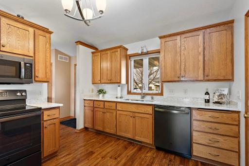 Very nice kitchen with new quartz countertops, all new black stainless steel appliances (2020), new sink, new garbage disposal, built-in pantry cabinet and vinyl plank flooring!