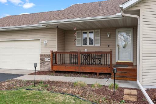 Nice Covered front porch with cedar decking!