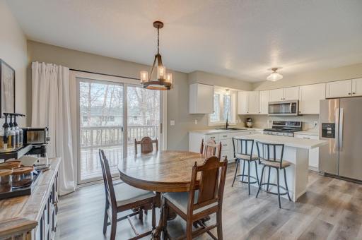 Host gatherings, while the reinforced walkout deck off the dining room provides a serene spot to enjoy the outdoors.
