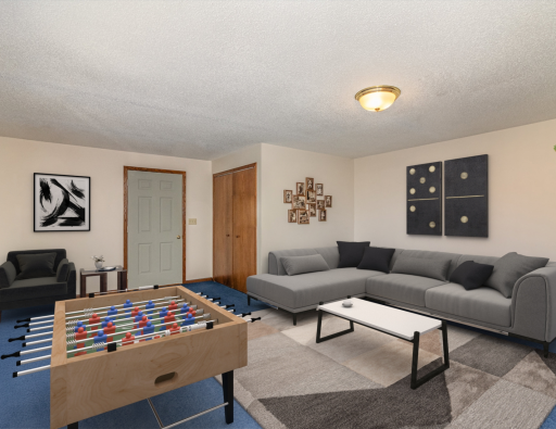 *Virtually staged* lower level bedroom, staged as a game room.