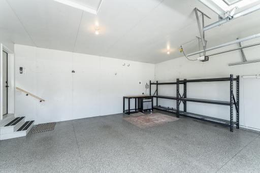 Finished garage with Polytek floor and shelving