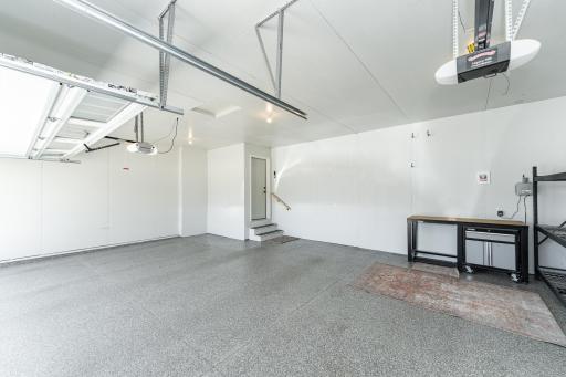 Finished garage with Polytek floor and shelving