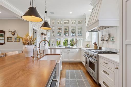 Glass front cabinets let in all the natural light.