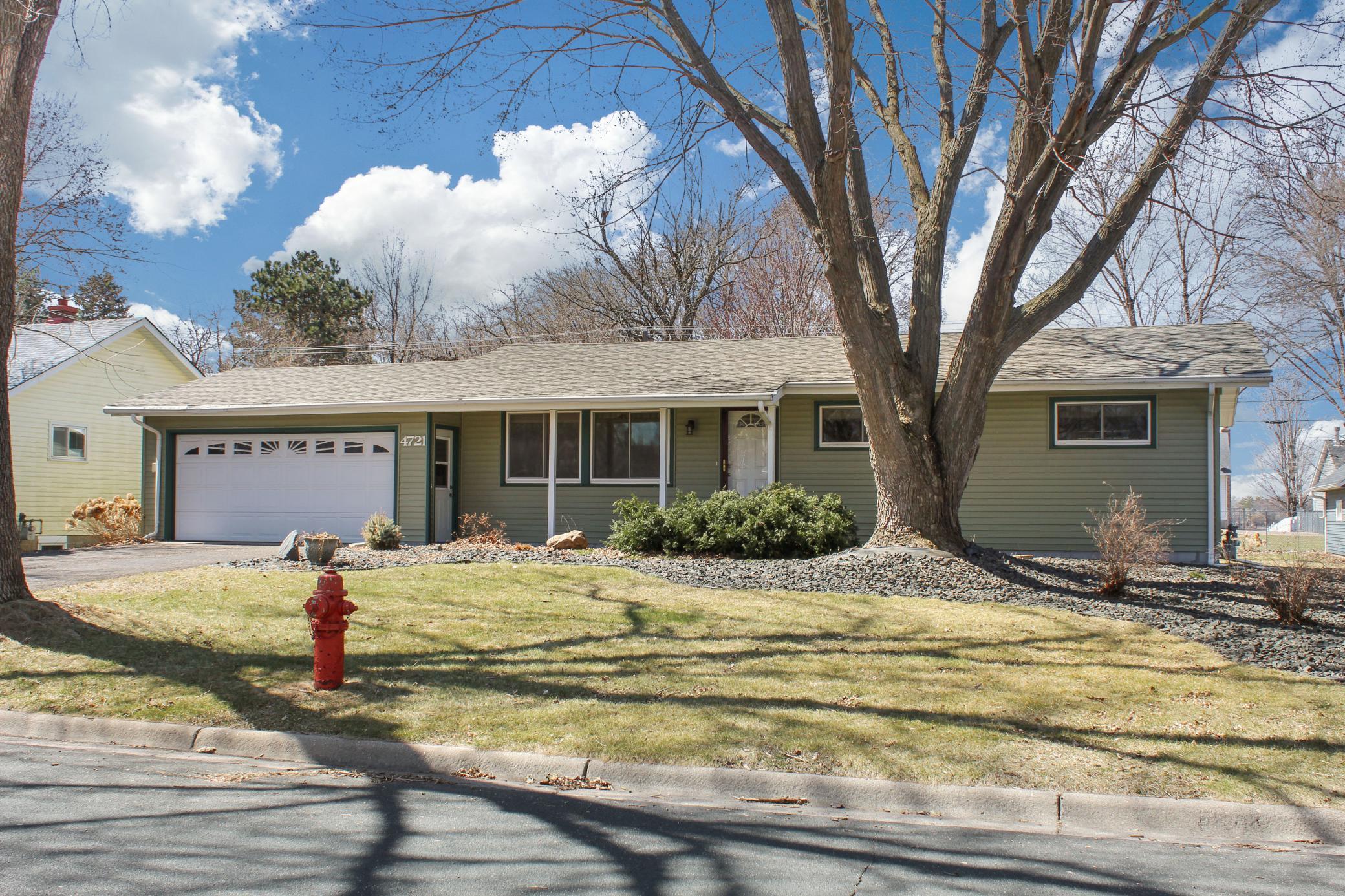 Classic rambler surrounded by mature trees