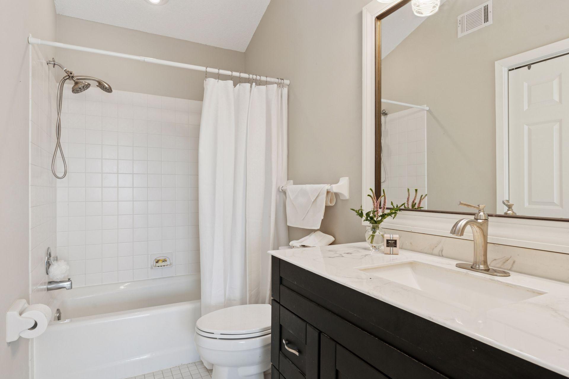 Full remodeled bath is also vaulted.