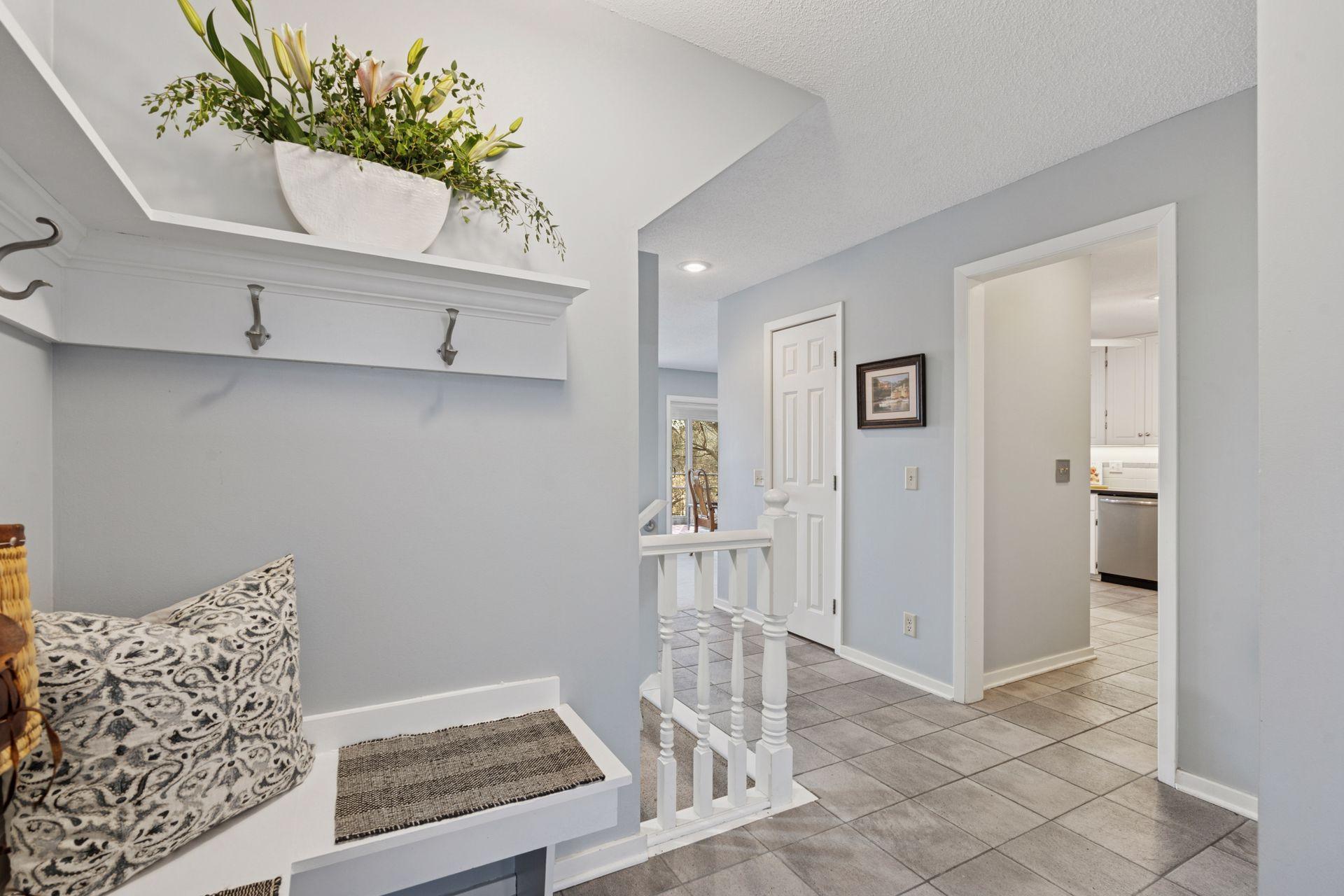 Your family and friends will be impressed from the moment they arrive inside the stunning foyer. Freshly updated main level paint and neutral decor.