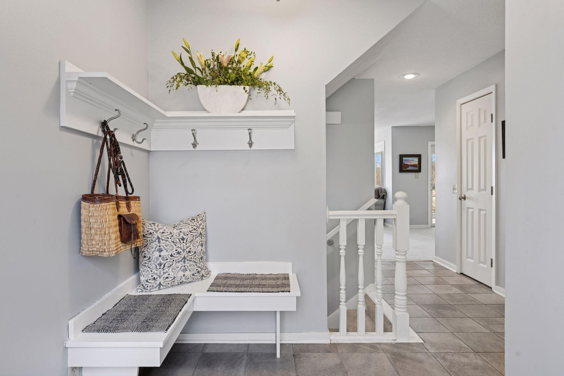 Step inside this lovely and unique townhome flooded with natural light. Almost every room in this private home has south facing windows and is surrounded with nature.