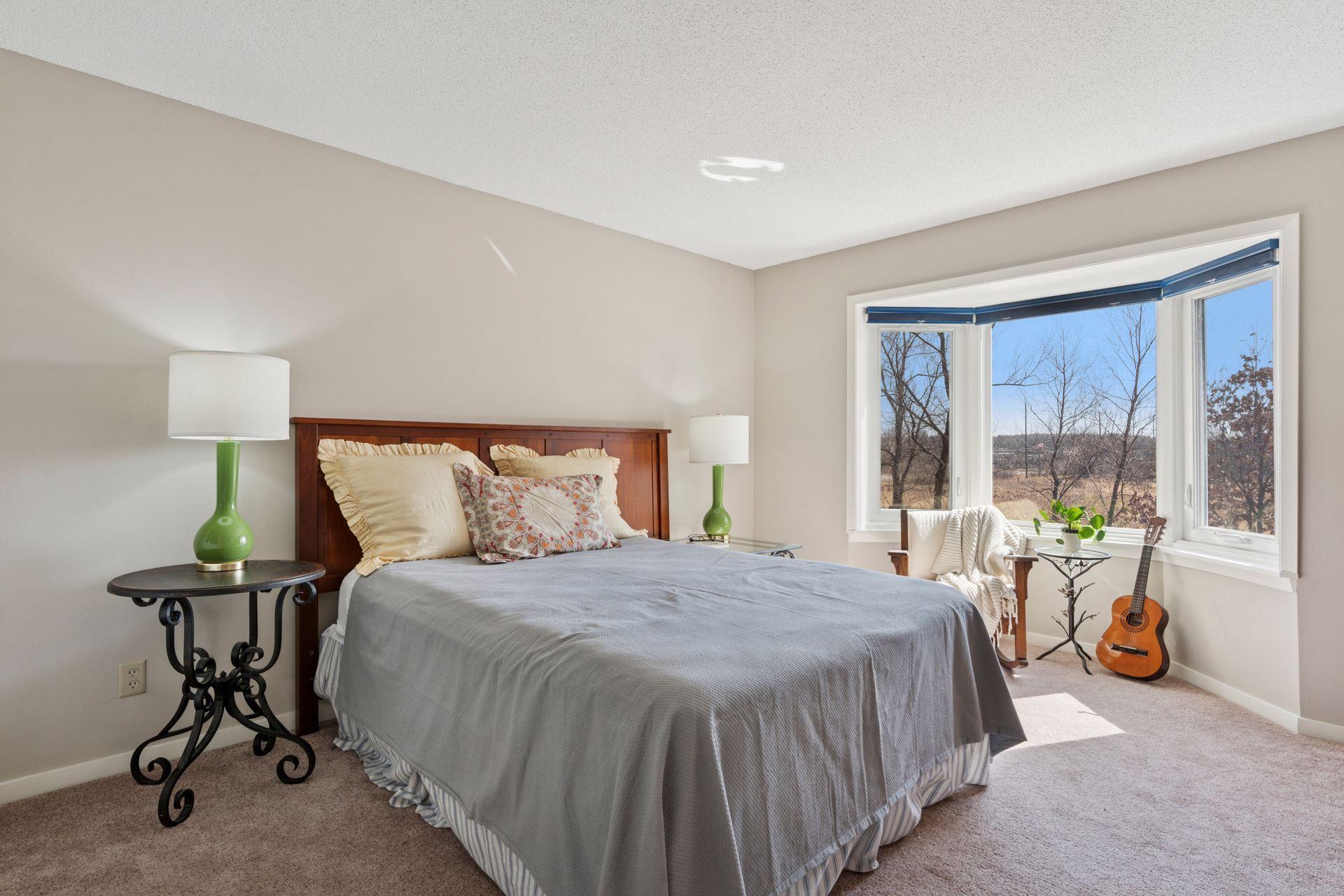 Exceptional 2nd bedroom is highlighted by bay window and a quiet place for a baby, your family or guests to relax.