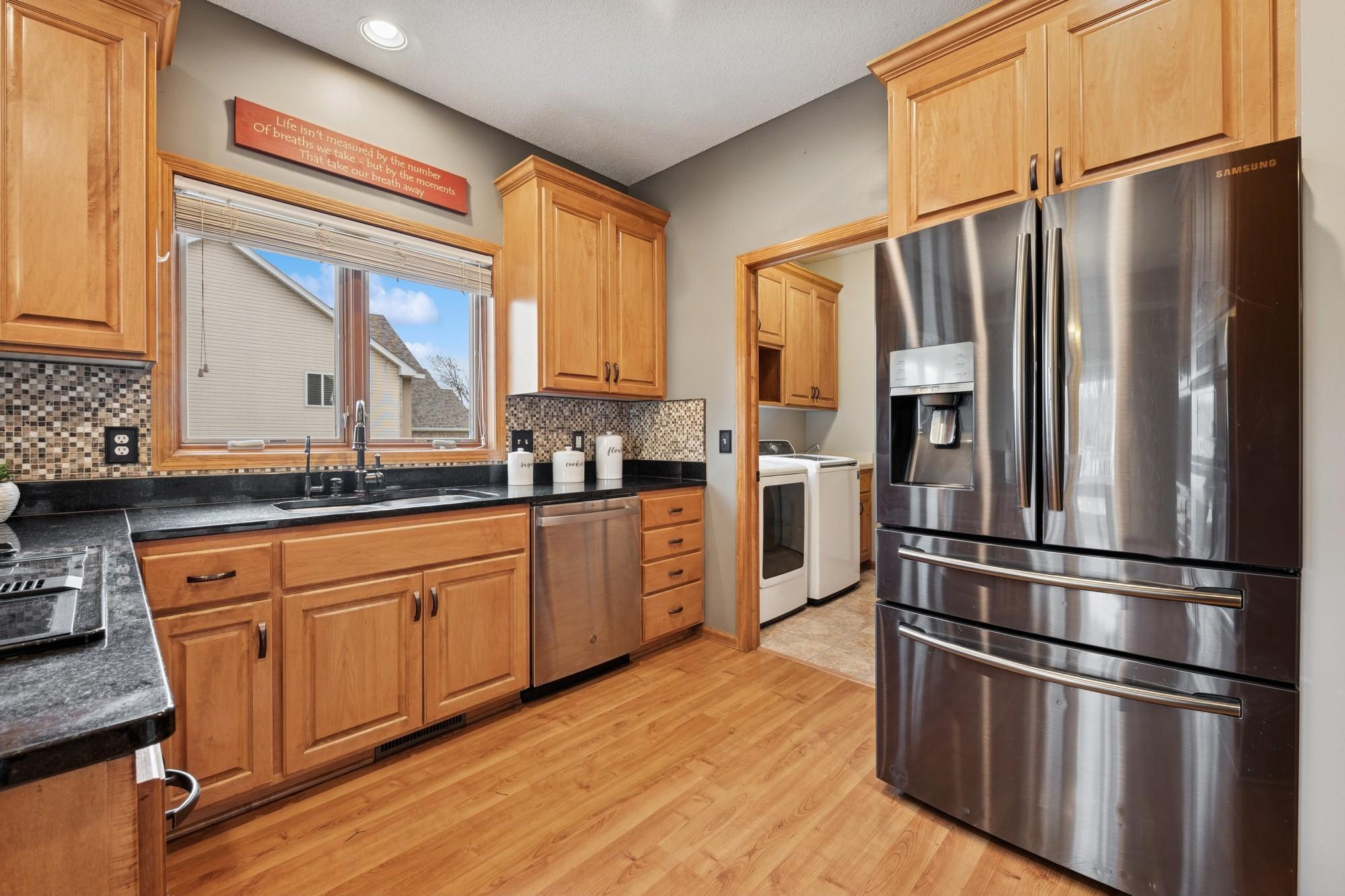 Large kitchen with newer refridgerator
