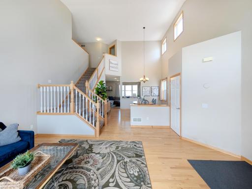 Spacious, open-concept sitting area welcomes you into the home.