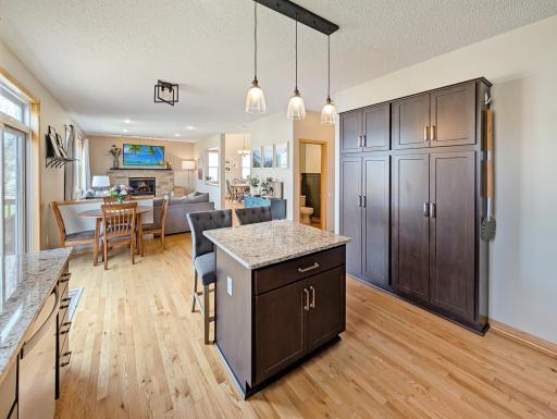 Island provides extra seating, storage, and prep space!