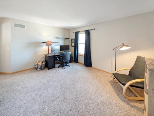 Upstairs office space or bedroom with closet.