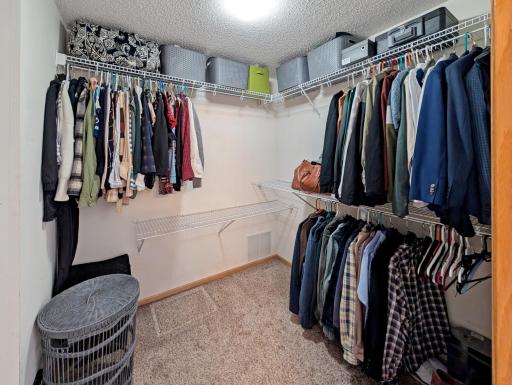 Spacious walk-in closet for all your storage needs!