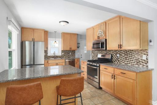 Wonderfully updated light soaked kitchen.