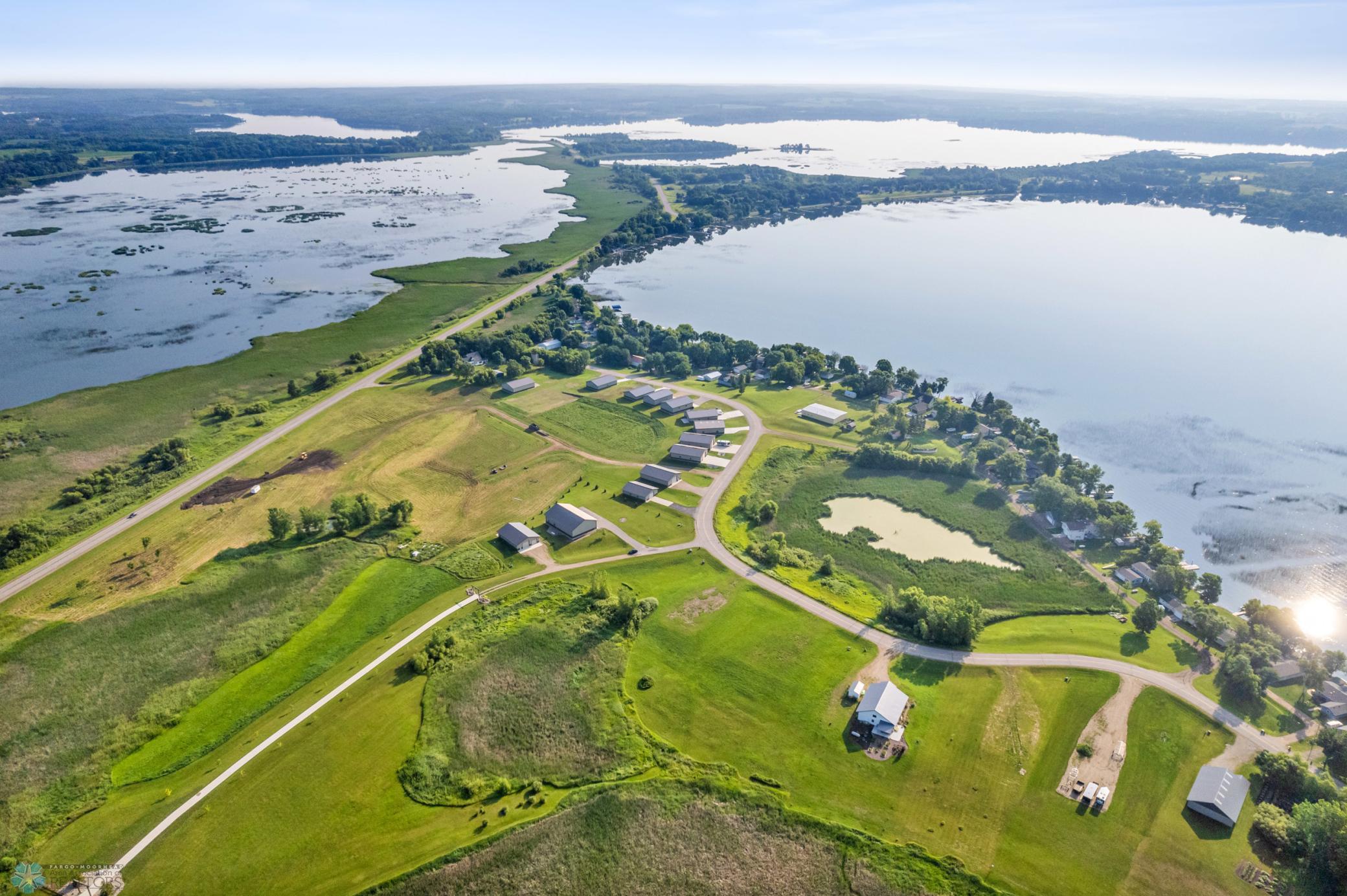 1.18 acre lot in the heart of lakes country located near the shores of Lida, Lizzy and Crystal! Optional HOA membership includes public swimming beach with hard sandy bottom, clubhouse access, heated pool and boat slip on Lake Lida.