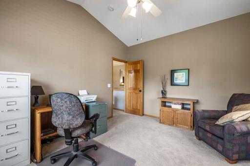 Main level den is spacious enough to be a second main level bedroom if needed
