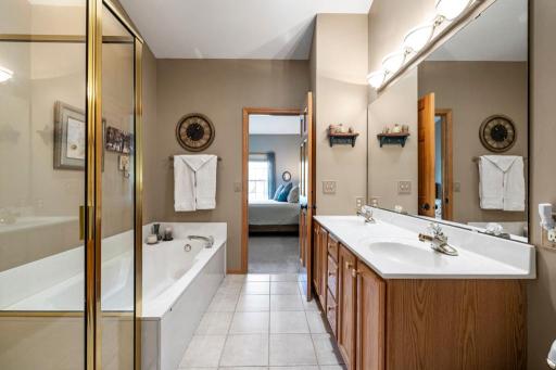 Spacious Primary bath with double sink and separate tub/shower