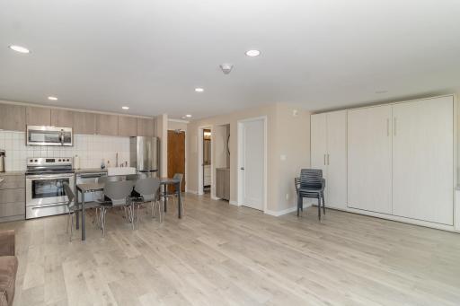Full kitchen, full bath, and a large Murphy bed on the right (which serves as a guest room!)