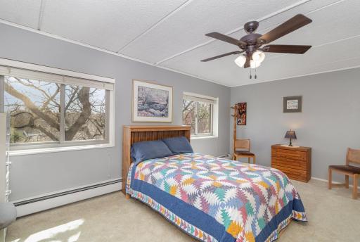 Second bedroom. Large windows facing south