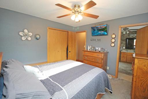 Main floor primary bedroom with walk through bathroom.