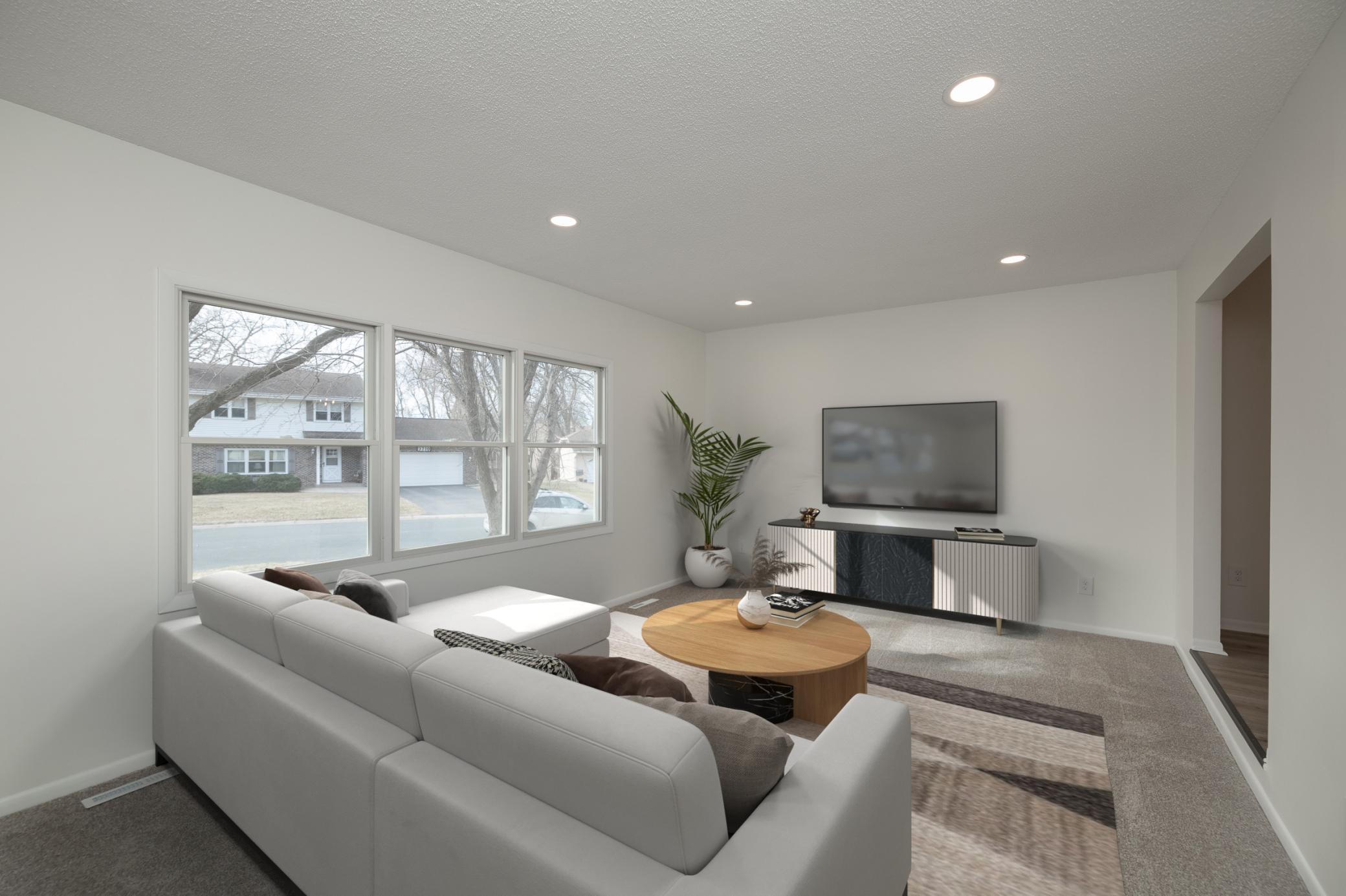 Virtually staged photo of main floor living room