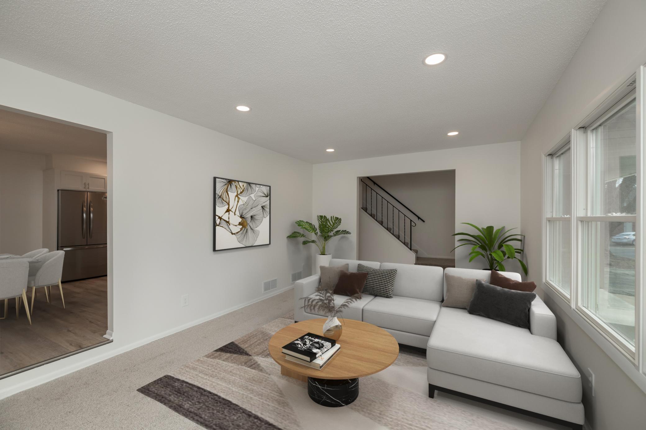 Virtually staged photo of main floor living room