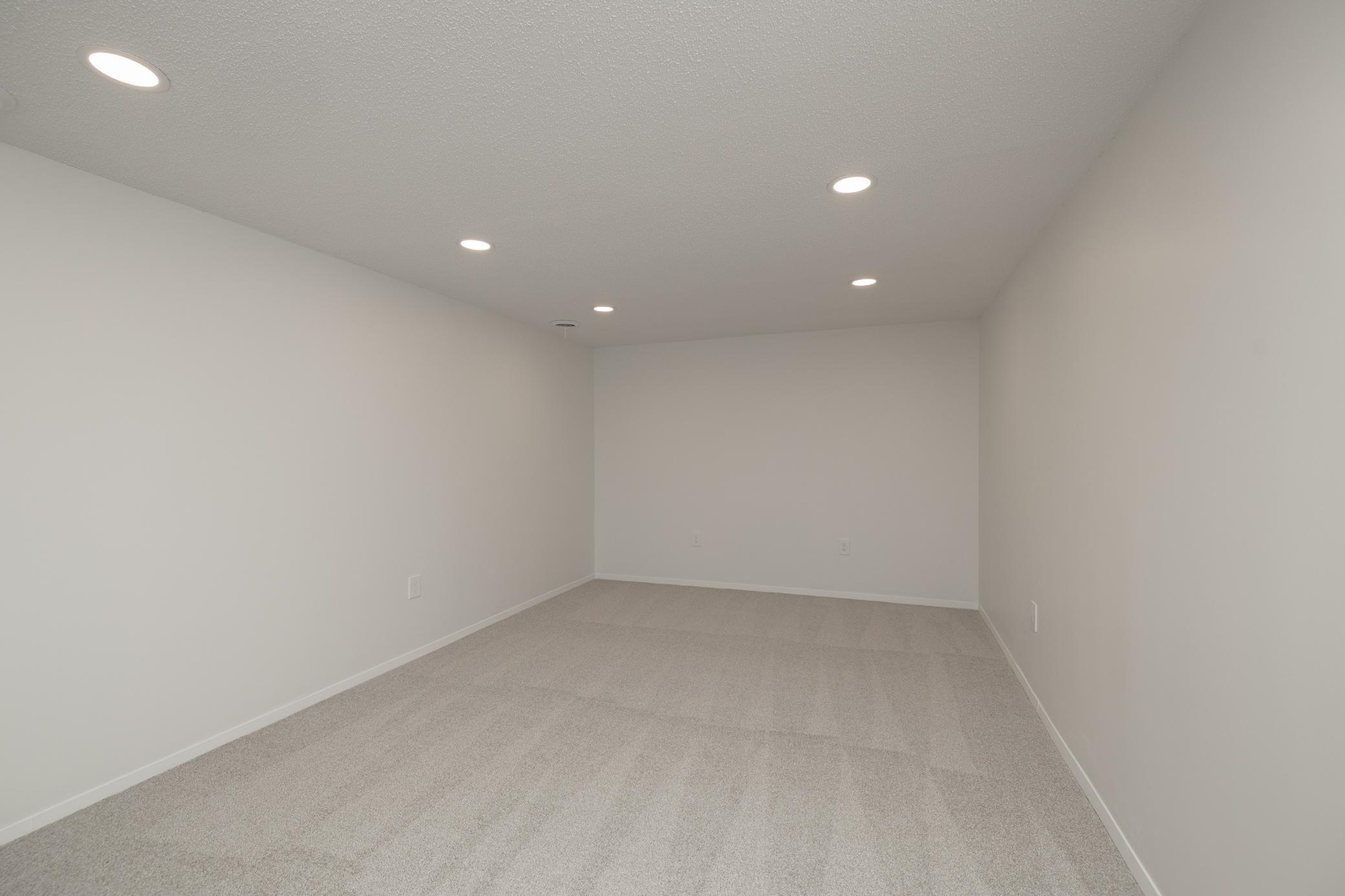 New carpet, recessed lights and fresh paint