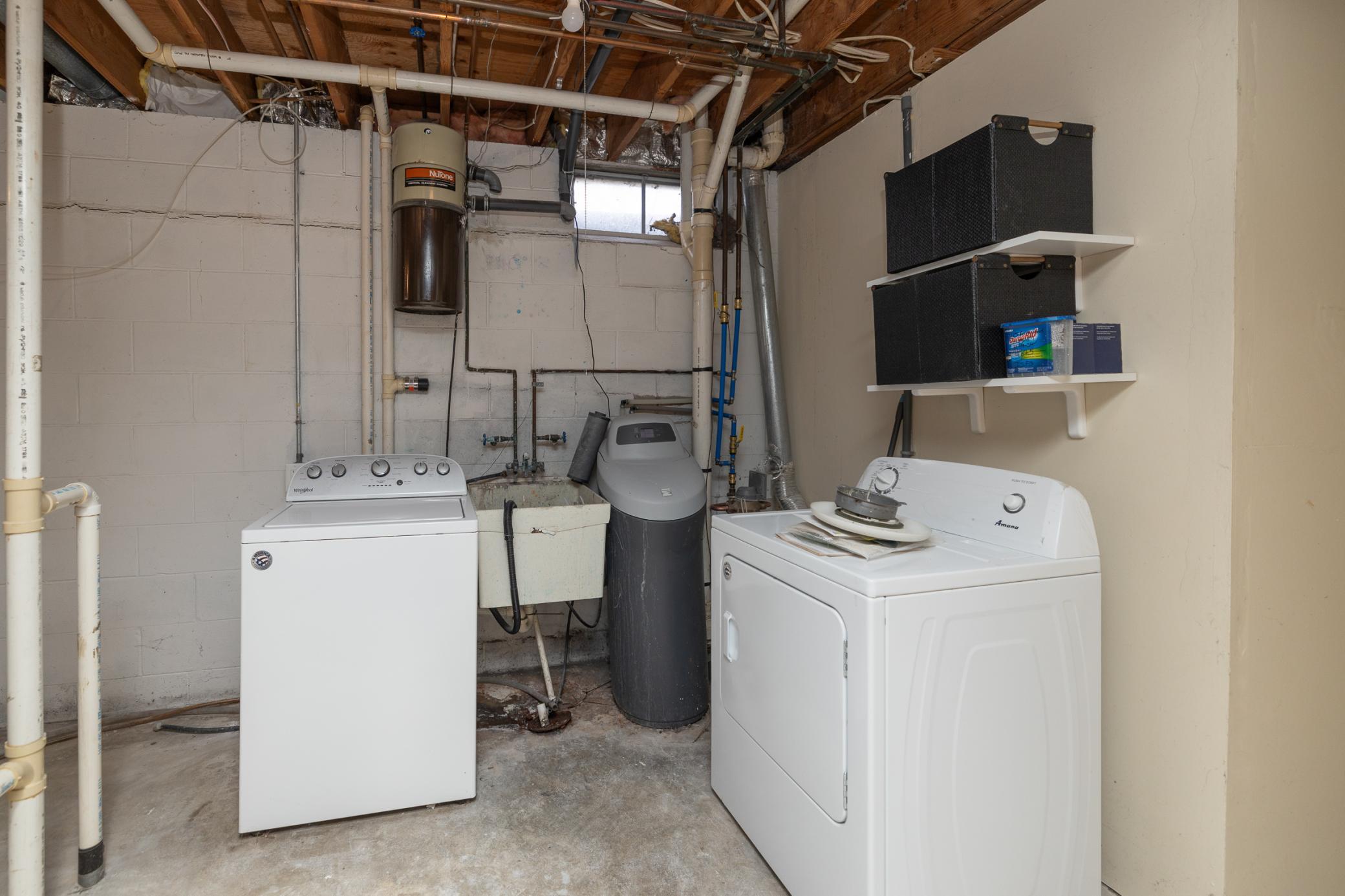 Lower level laundry area. Basement is also roughed in for additional bathroom