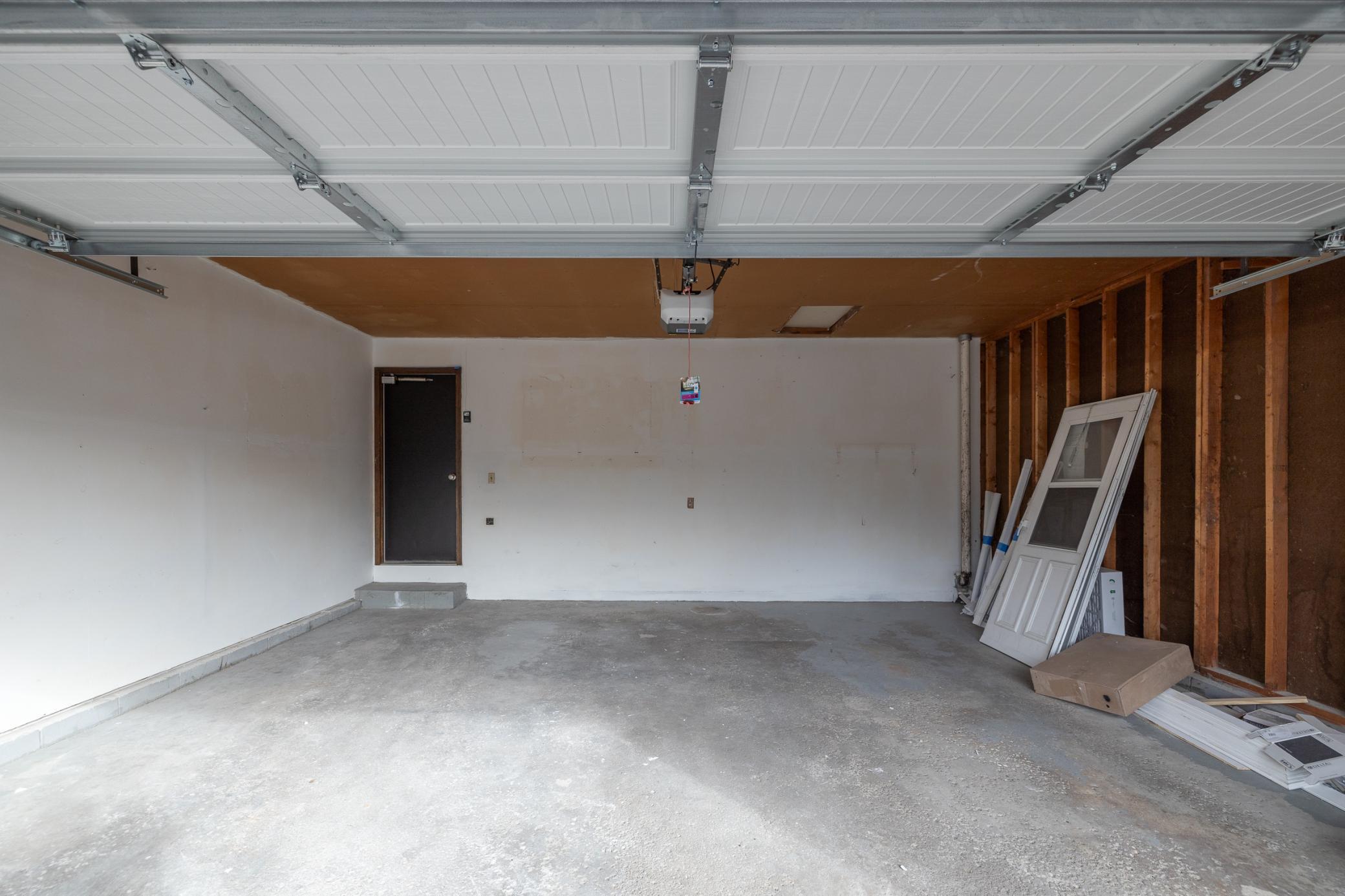 Attached 2 car garage with new overhead door