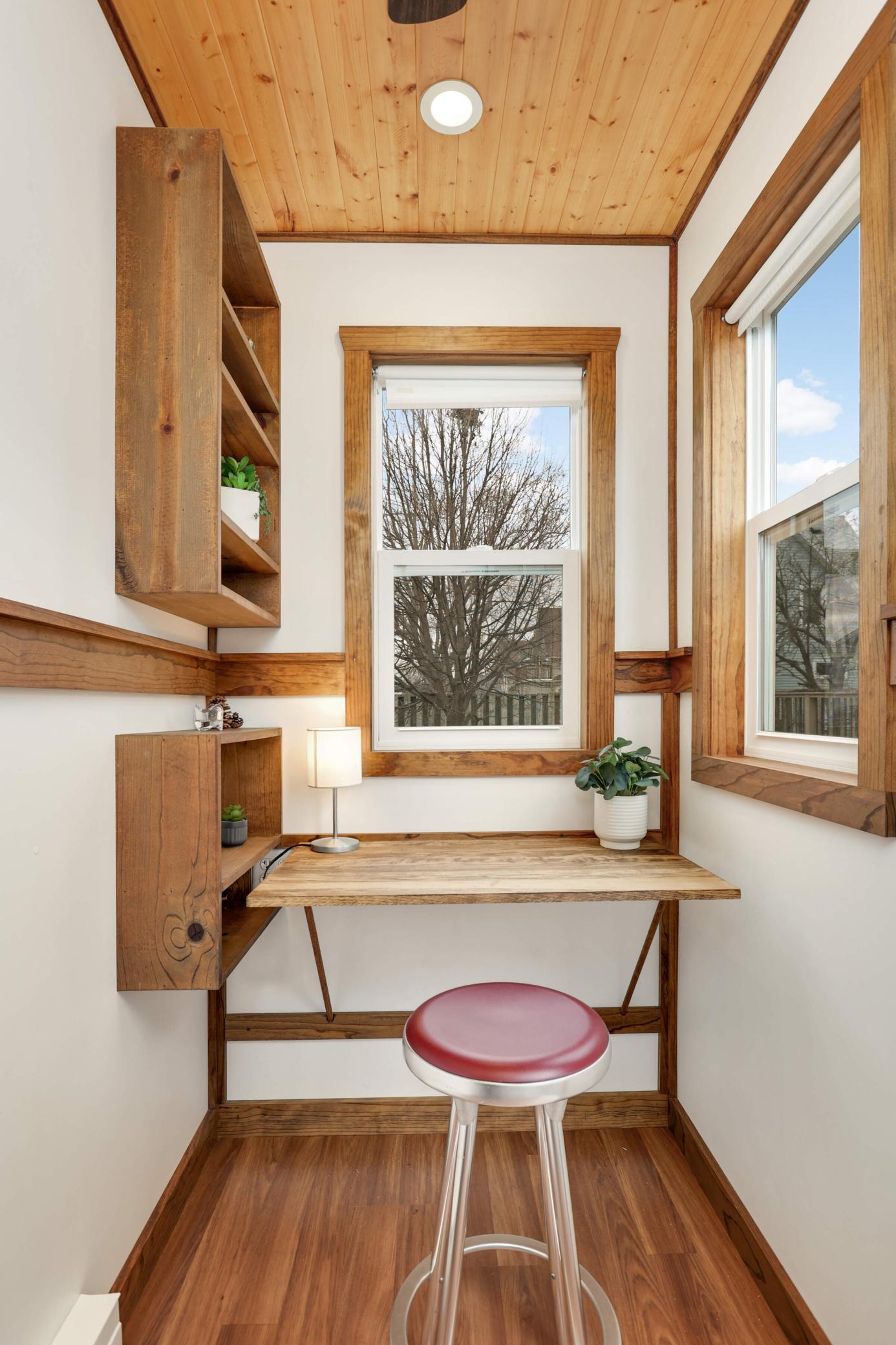 Heated office space offering a private and functional area for work, creativity, or relaxation.