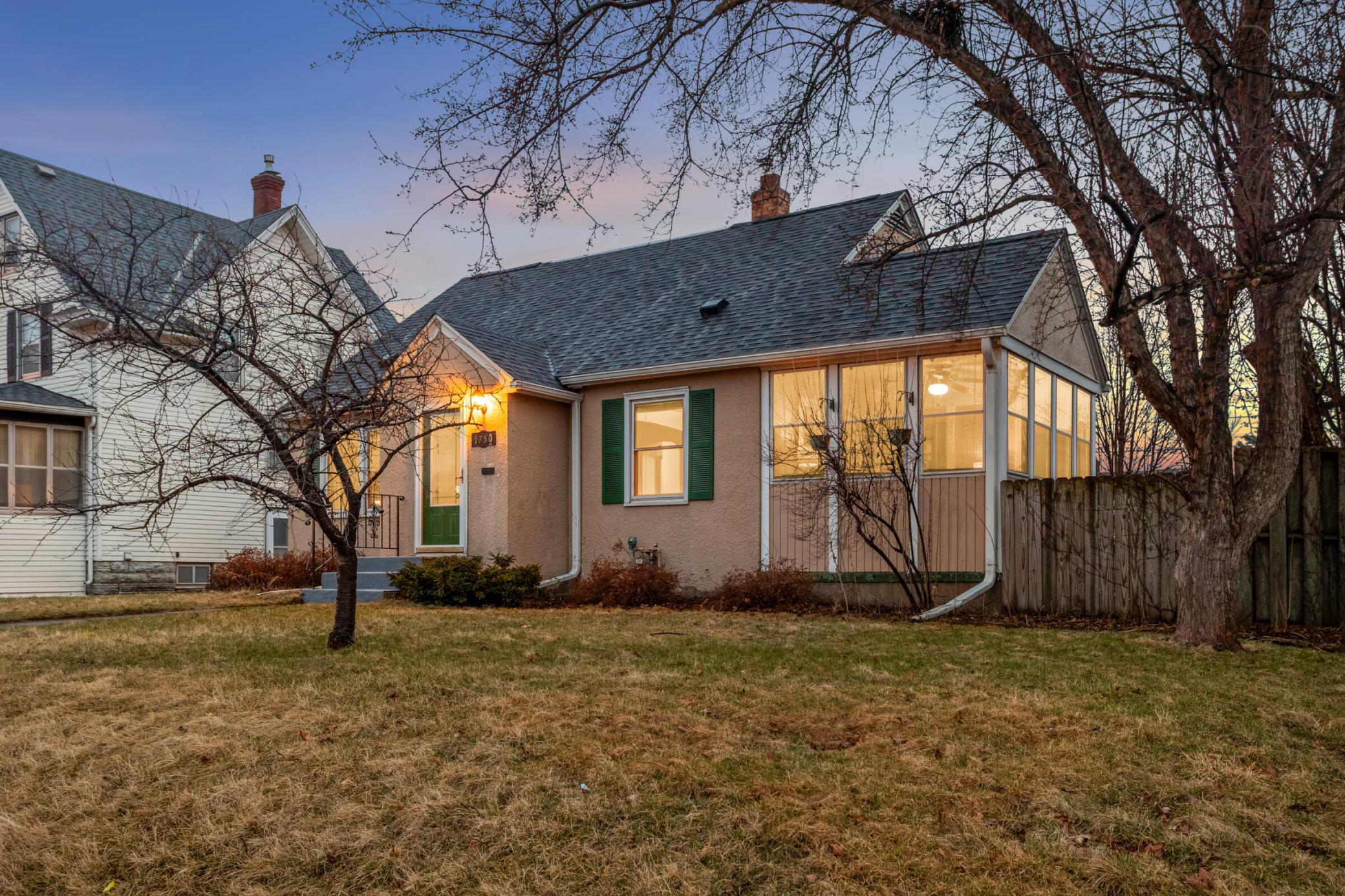 Charming 1.5-story home showcasing timeless character, thoughtful updates, and inviting curb appeal.