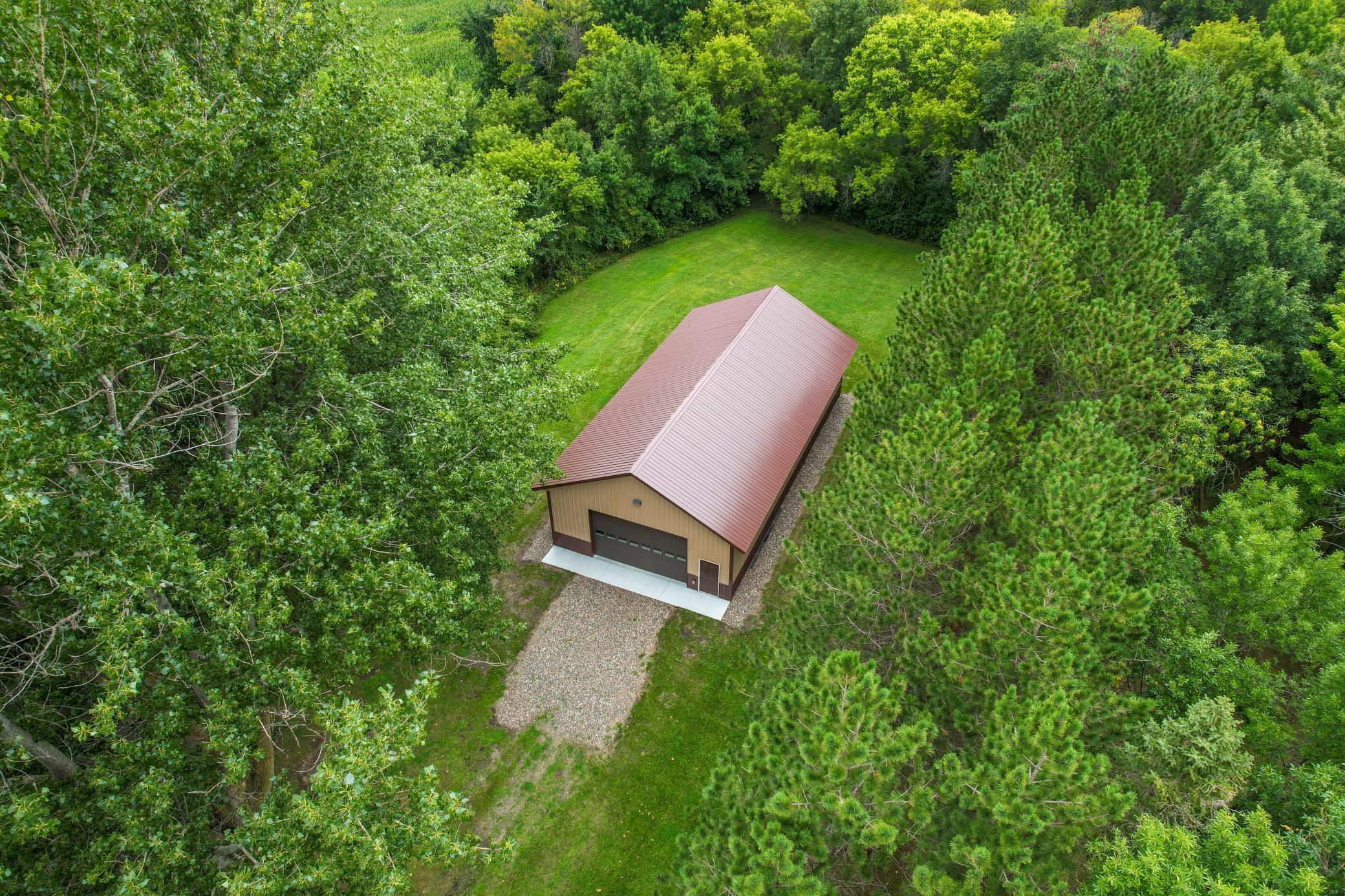 This 30 x 60' shed was constructed in 2023. Landscaped all around it.