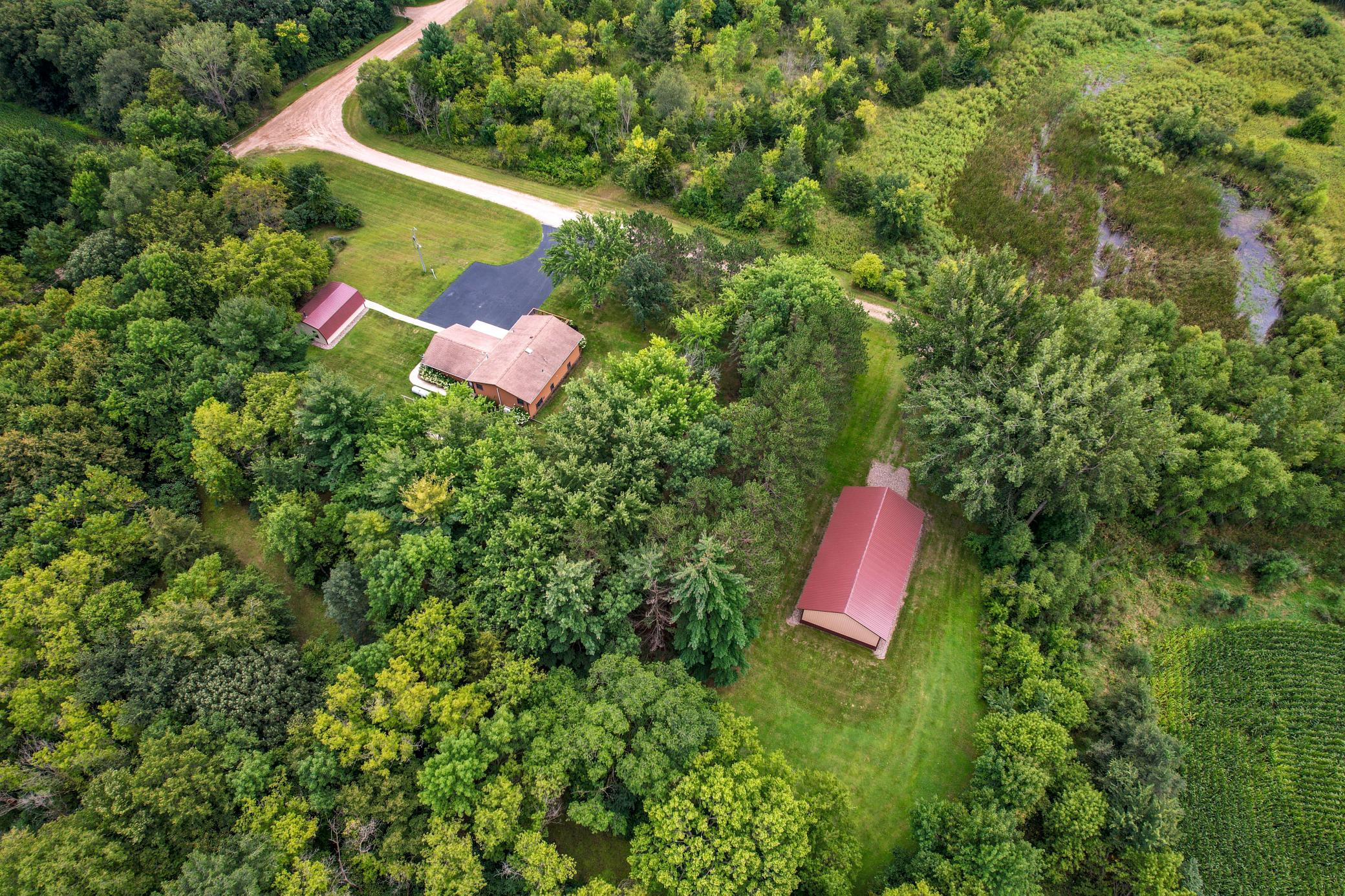There is a small pond area on the property. The woods behind the house a great place to explore.