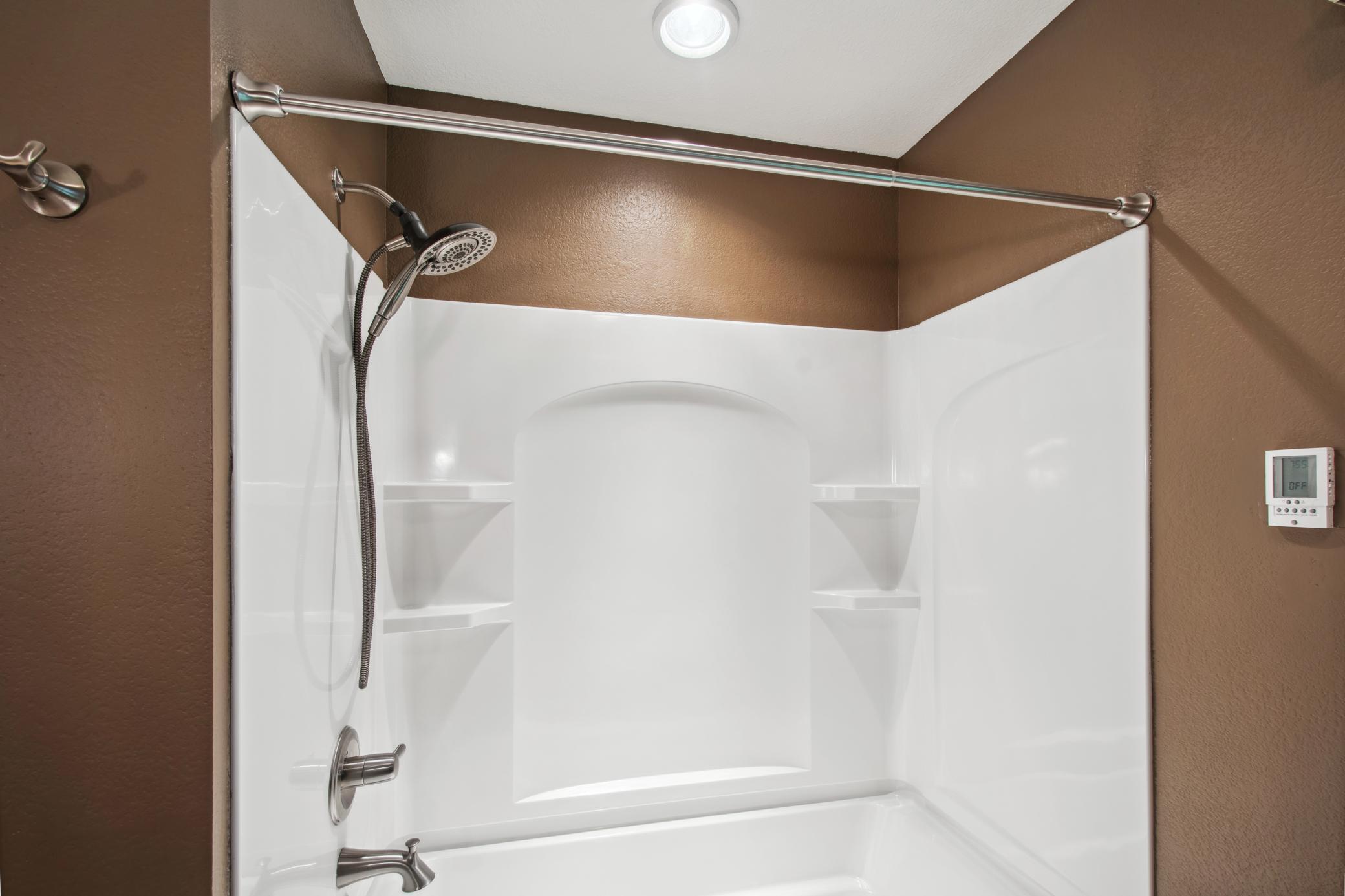 Custom vanity with marble top, new tub/shower and toilet in 2014.