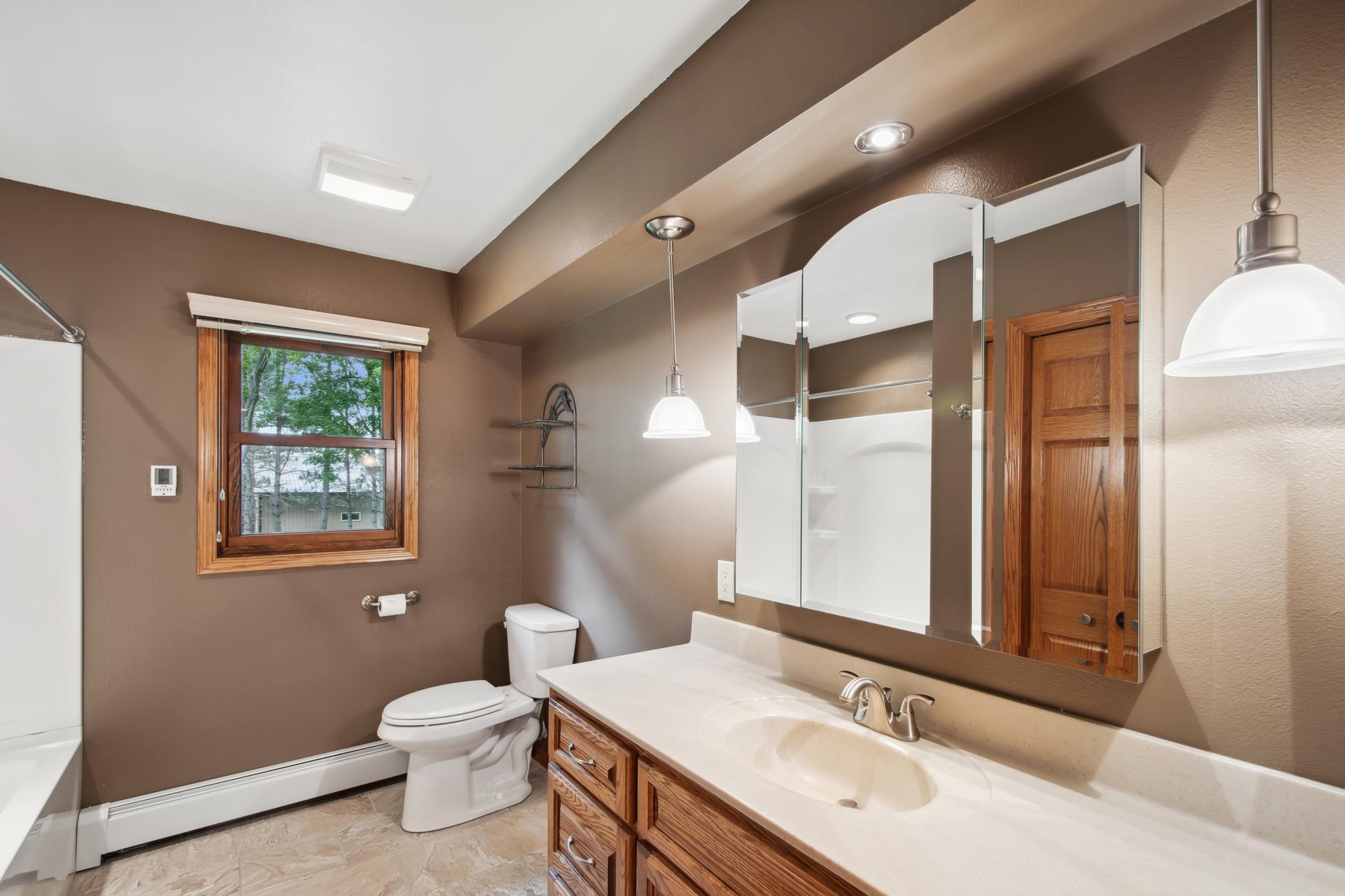 Upper level bath was with tile floors and in-floor heat.