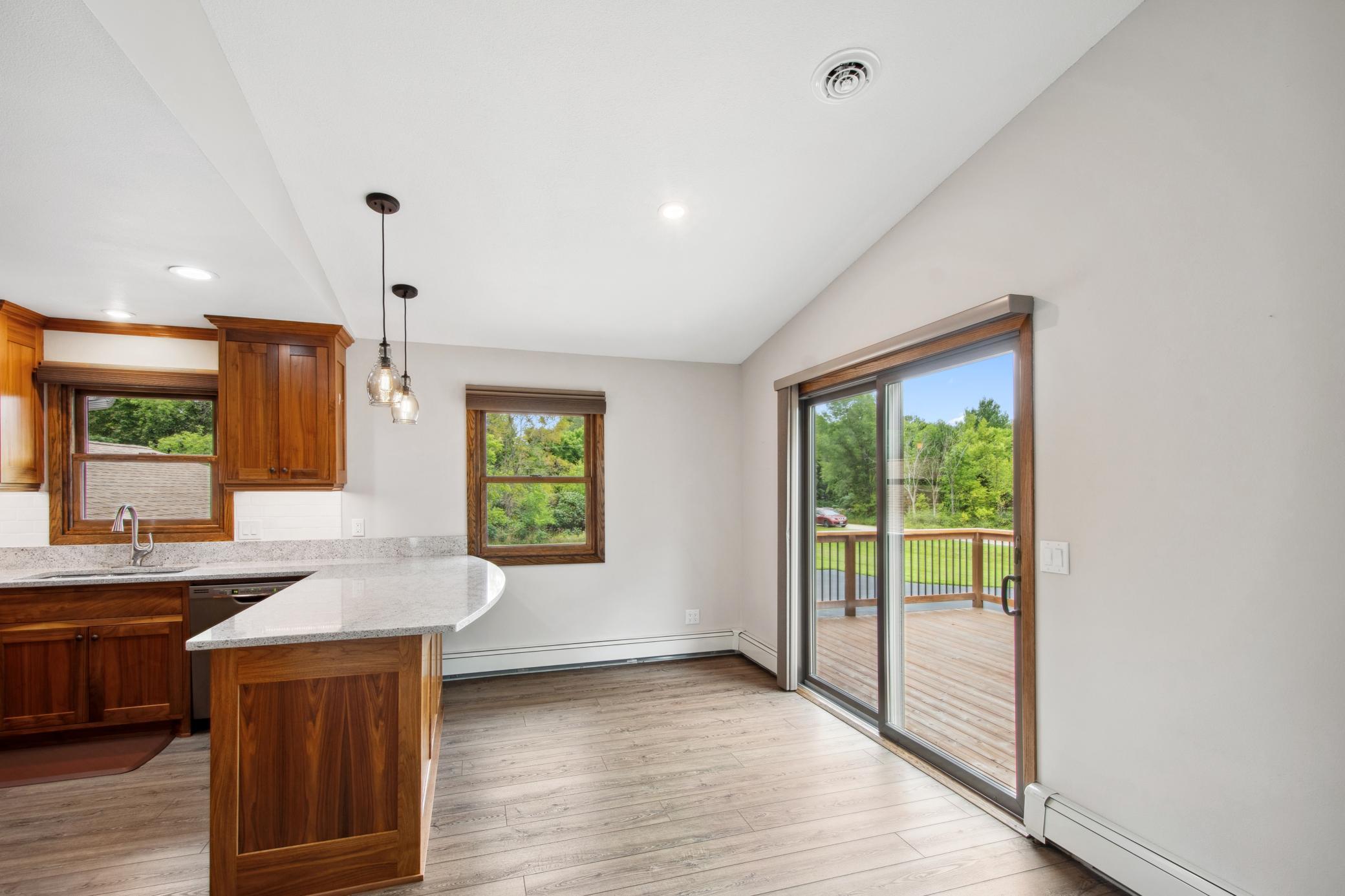 Dining area walks out to the spacious deck.
