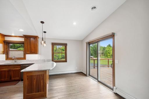 Dining area walks out to the spacious deck.
