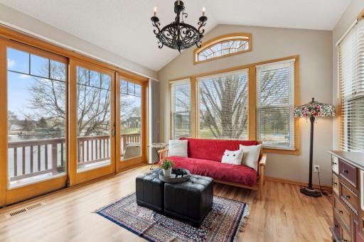 Main Floor Sun Room with beautiful views of the bay and access to a private deck