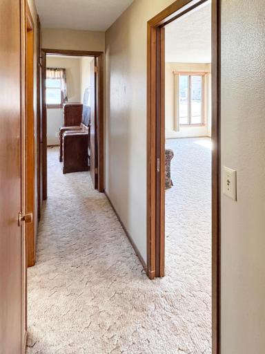 Hallway with 2 closets for storage, and also a pocket door to close off the sleeping area!