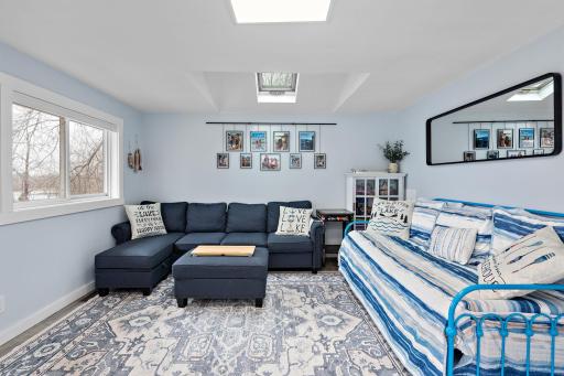 Sun-filled main level living room, also can be used as a 3rd bedroom!