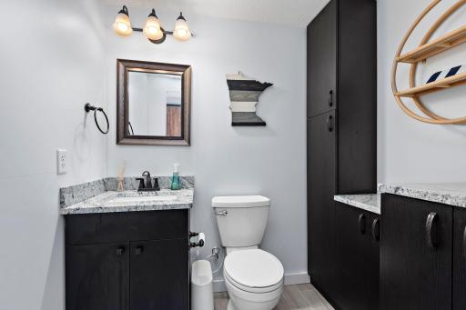 Tastefully updated lower level 1/2 bathroom!