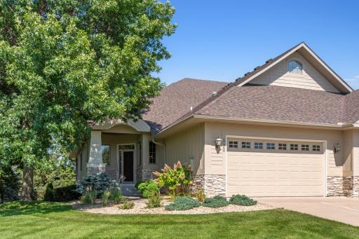 Welcome to 17366 Hanson Ct a beautiful twin home that provides one-level living.
