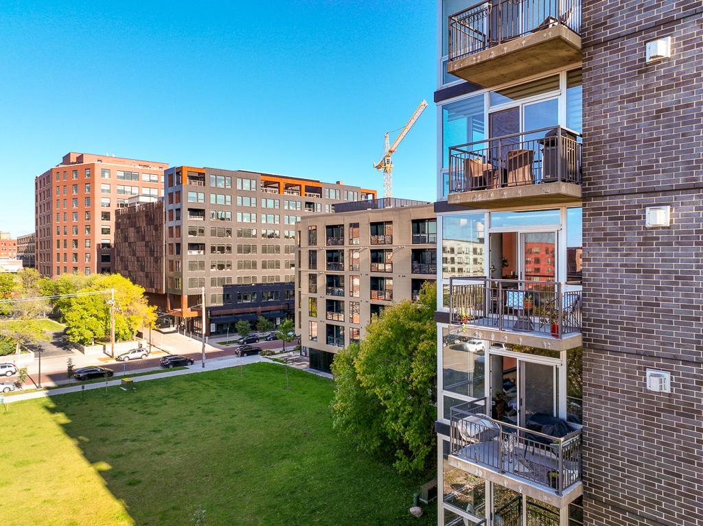 Located on the quiet side of the building and adjacent to City-owned green space.