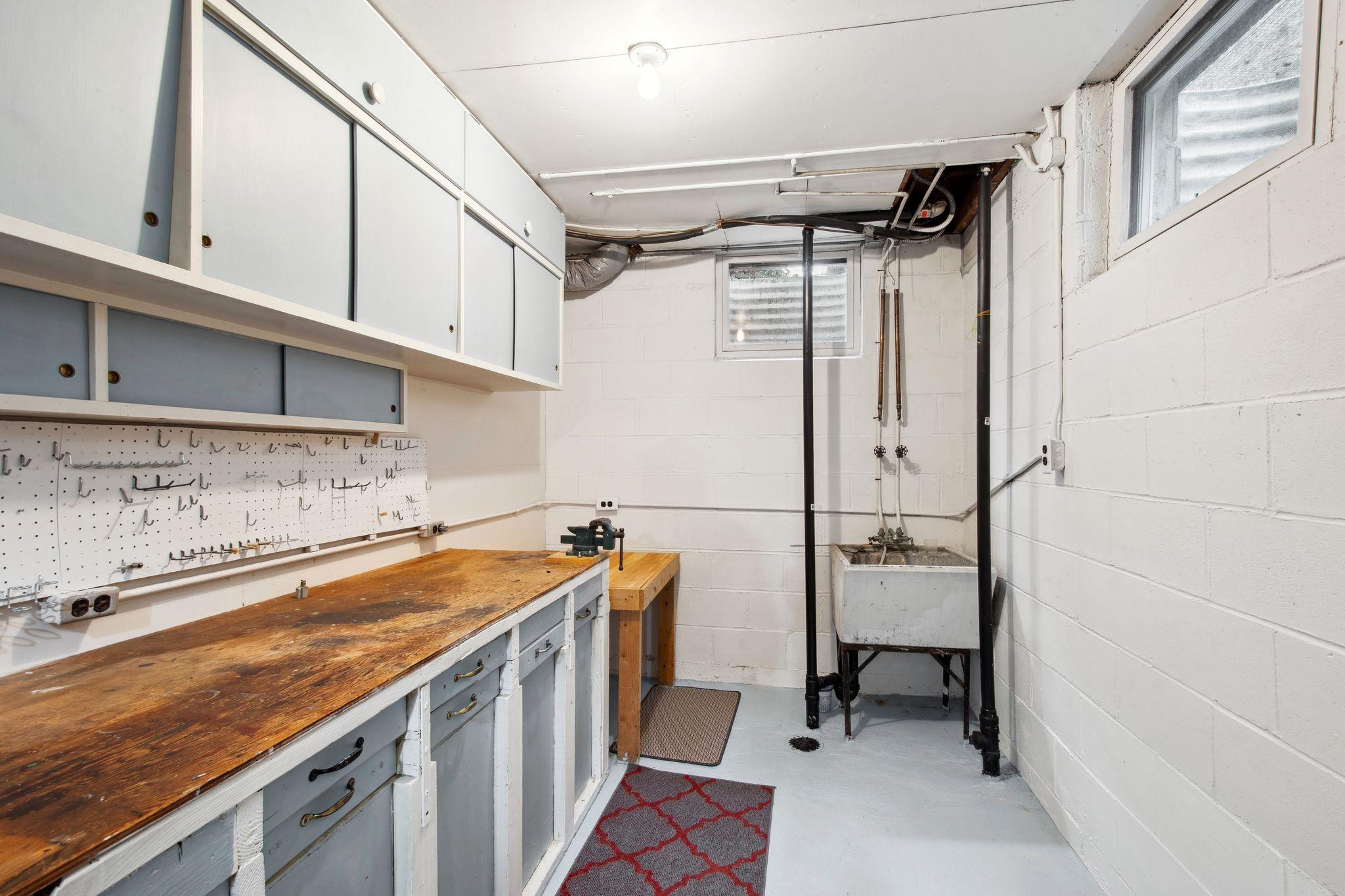 Basement hobby room. The new buyers could move washer and dryer to this room if desired.